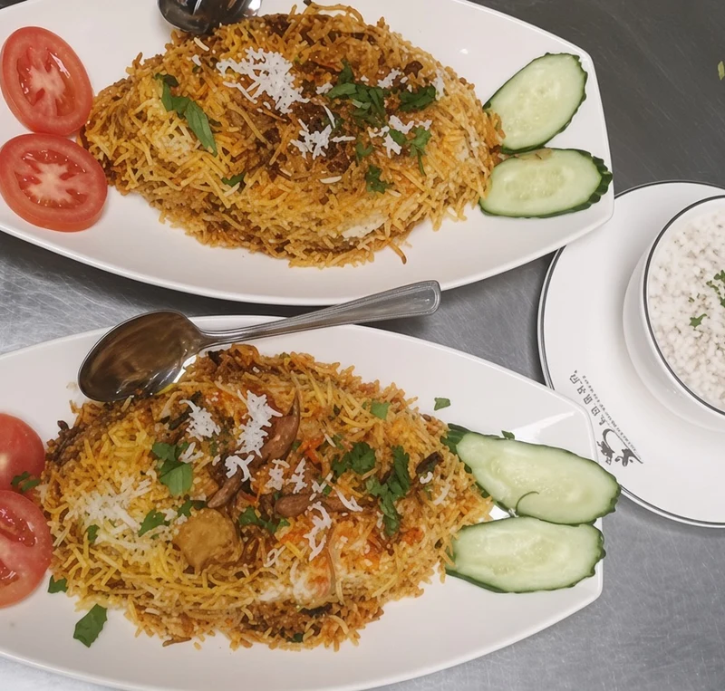 Chicken Biryani with basmati rice at Darbar Restaurant, Indian food in Saskatoon, SK